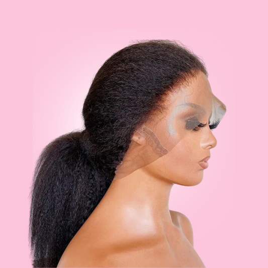 A wig with a straight, kinky style, worn by a mannequin with a realistic appearance including a full head of hair.